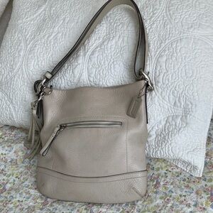 Coach Pebble Leather Shoulder Bag and Crossbody in Cream Color.